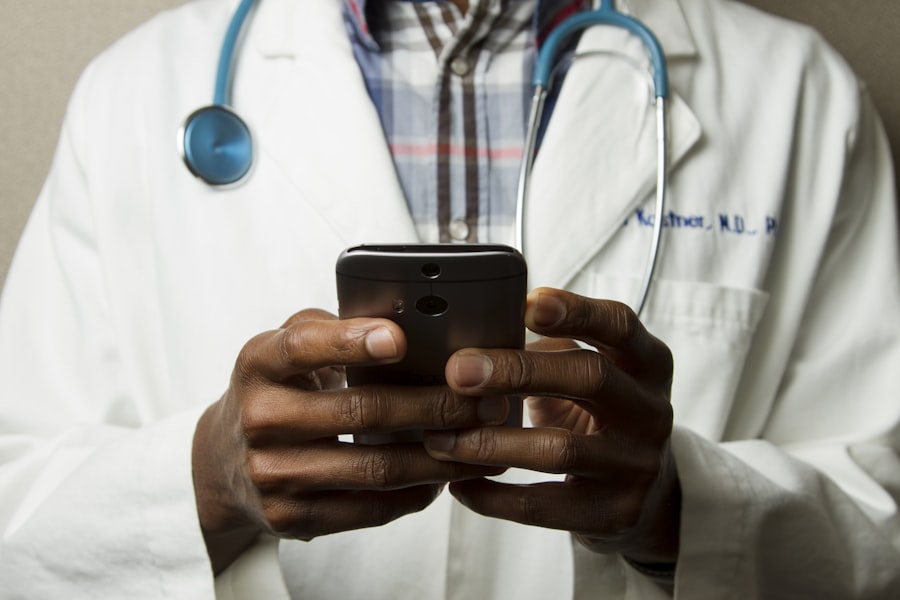 Healthcare professional reviewing data on a laptop
